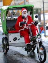 Santa Claus on a rikscha